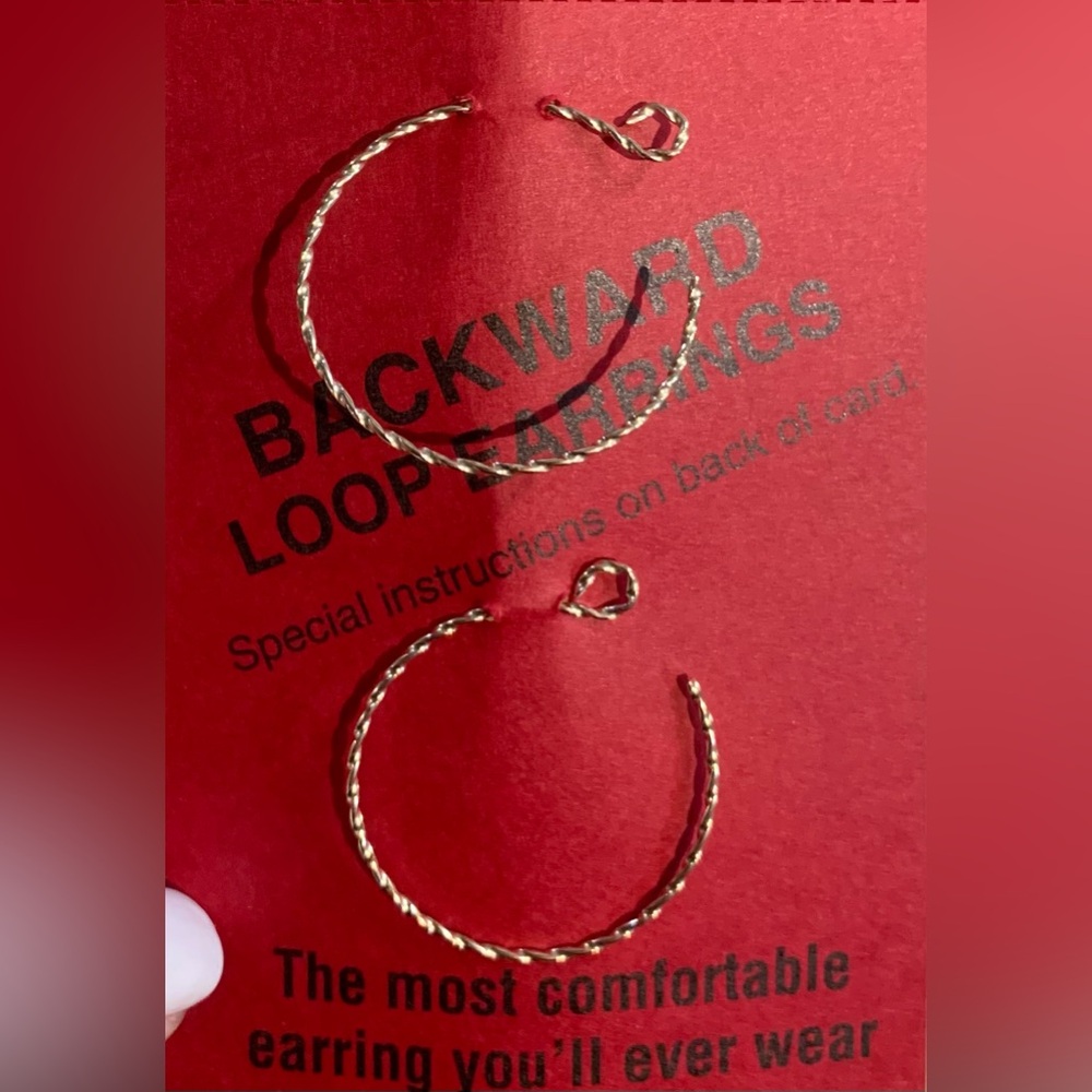 Backward loop gold hoop twist earrings